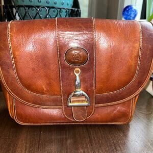 Vintage Francesco Conti brown leather saddle bag metal bit closure crossbody